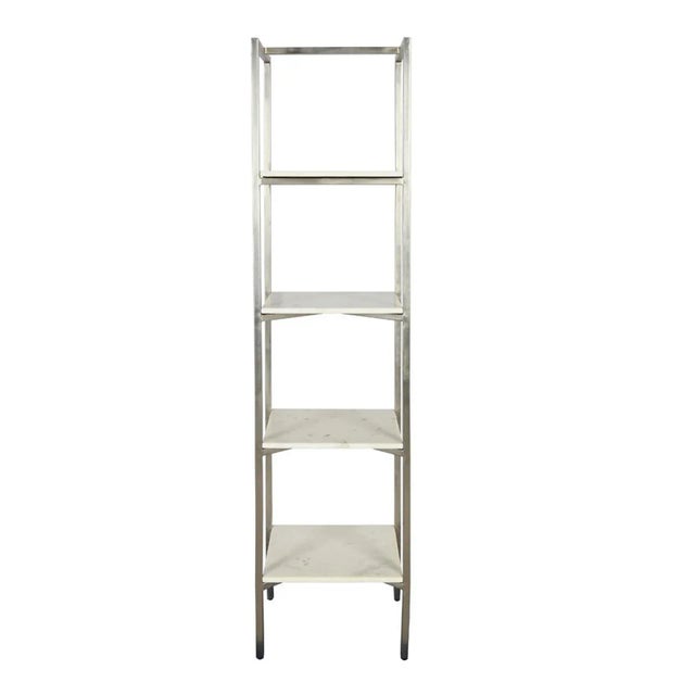 Nickel finish iron frame narrow display shelf with white marble shelves. Beautiful modern sleek design. Each may have...