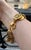 Beautiful 1990s Chanel Charm bracelet purchased in Paris, France. Rare Chanel item from the 1990s. Some patina on charms...