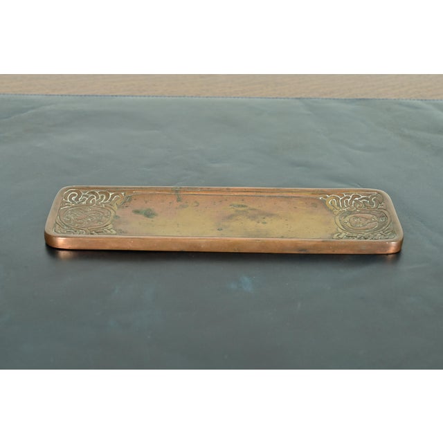 A gorgeous antique Arts & Crafts or Art Deco period bronze pen tray or desk tray featuring Zodiac designs By Tiffany...
