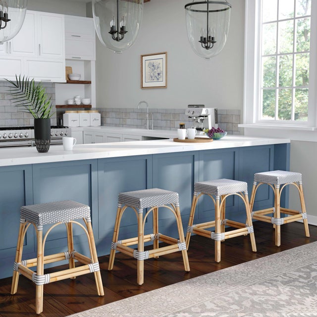 Evoking images of sidewalk tables in the Cote d'Azur, counter stools like this will give your kitchen, dining area, or...