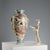 Satsuma vase decorated with scenes of daily life in the reserve. Rich gold highlights and mask-shaped side handles. This...