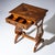 Biedermeier sewing table veneered in walnut with one drawer and brass fittings. The interior is fitted with small...