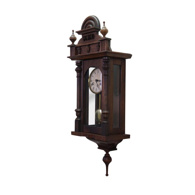 Antique German Junghans Vienna Regulator wall clock, converted to battery power. Made of walnut featuring an arched crown...