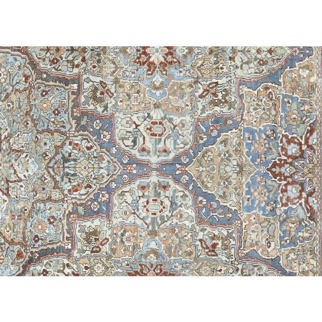 Crafted in the Baktiari region of Iran, this Semi Antique Persian Baktiari Rug showcases the rich history and artistry of...
