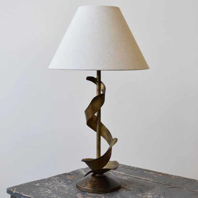 Vintage Spiraling Gilt Metal Table Lamp with Oak Base Attributed to Yasha Heifetz, Circa 1950s. Designed around a gilt...