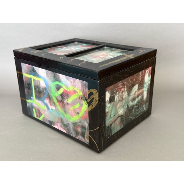 This one of a kind graffiti bodies decorative art box was created by the artist Carrie Notari. Using her unique montaged...