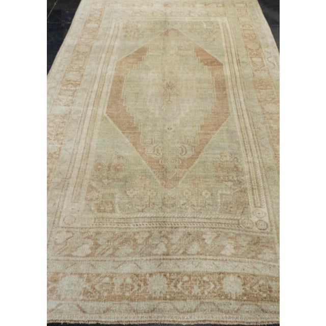 Turkish Vintage Rug Faded Mint & Soft Terracotta Handwoven Wool Rug 5'5" X 9'4" This vintage Anatolian Turkish rug is a...