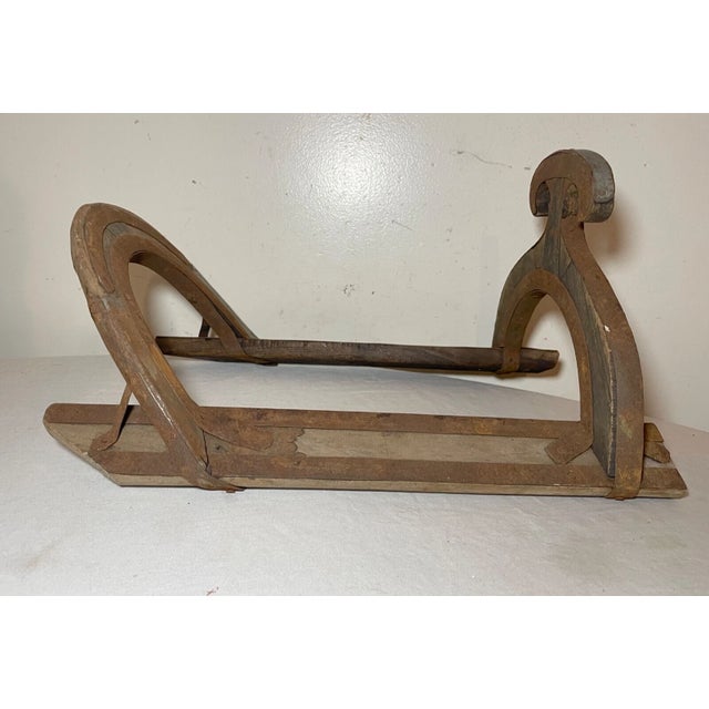 This antique handmade primitive carved wood and wrought iron child saddle tree is a true masterpiece of craftsmanship. The...