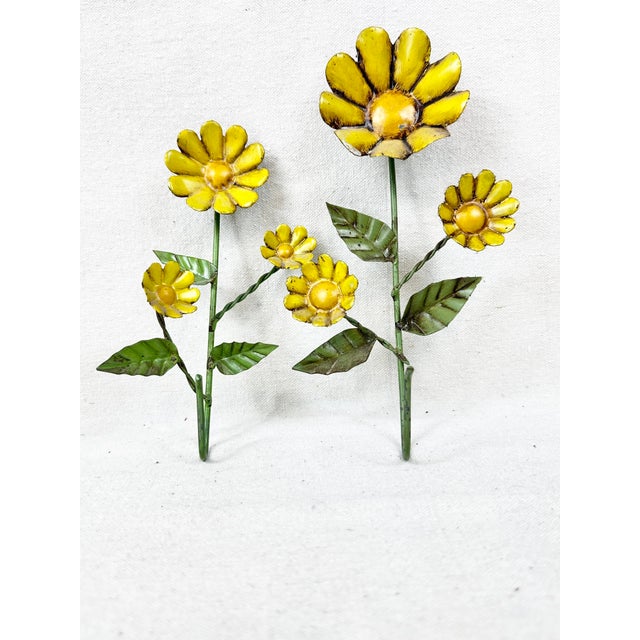 Bring a cheerful touch of vintage charm to your space with this delightful pair of mid-century yellow metal flower wall...