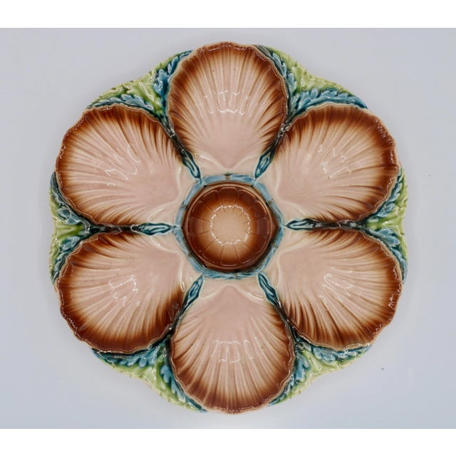 A stunning Art Deco style French oyster plate with lovely shades of blue, green and peach. With a unique geometric shape,...