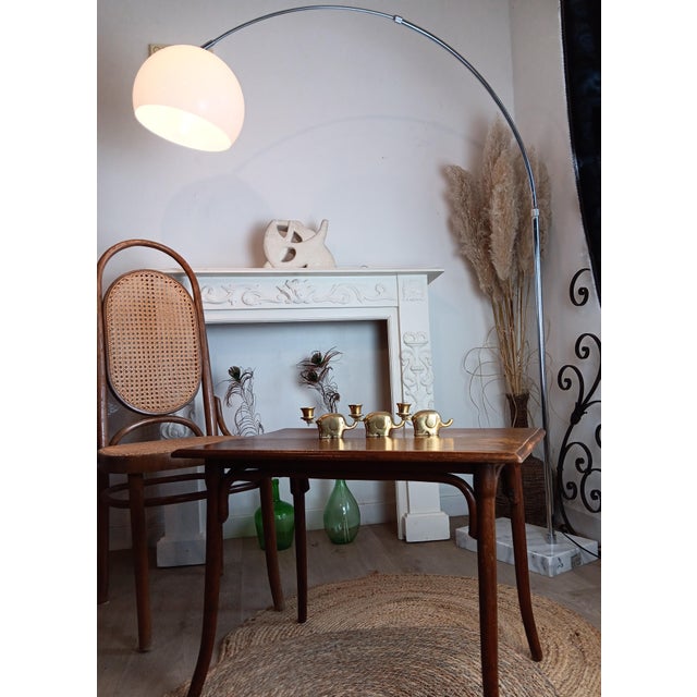 This coffee table is distinguished by the elegance of its curved legs and its vintage look. Its beautifully waxed top...