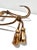A pair of vintage gilt metal curtain tiebacks formed as twisted rope with sculptural tassel finials. The substantial cast...