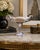 A beautiful vintage 1970s Westmoreland slag glass compote featuring an elegant pedestal form and striking gray-and-white...