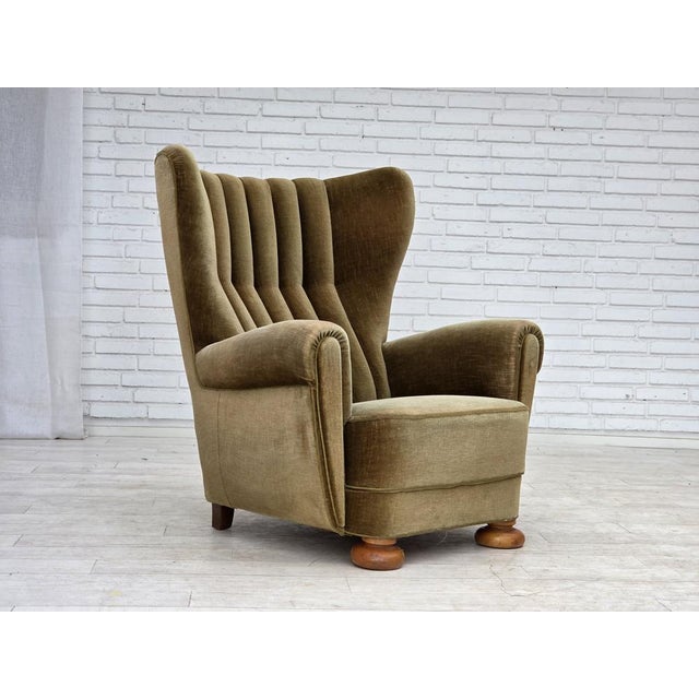 1960s, Danish highback relax armchair. Original green furniture velour, brass springs in the seat. Original good...