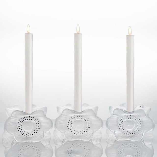 Luxury at its finest, A collector’s item made by Lalique in France. This is a pair of Lalique Three Anemones pattern...