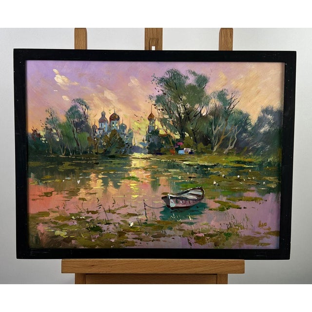 Oil painting Abandoned Boat on the River Yuriy Suprunchuk is a luminous and atmospheric landscape that captures the quiet...