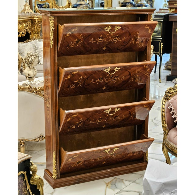 Elegant French-style shoe cabinet crafted with exquisite marquetry, intricate floral inlays, and refined bronze ormolu...
