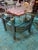 Bring vintage sophistication to your space with this Vintage Brass and Smoked Glass Side Table, likely dating to the late...