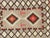 Dating to around the 1930s, this handwoven Navajo rug features a bold, graphic layout that reads beautifully in both...