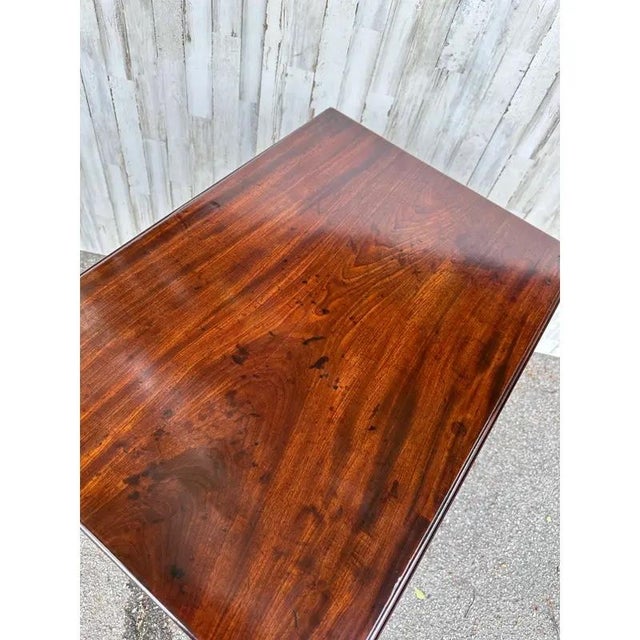 There is an absolutely stunning English Pembroke table from the mid to late 19th century. The color and the depth of the...