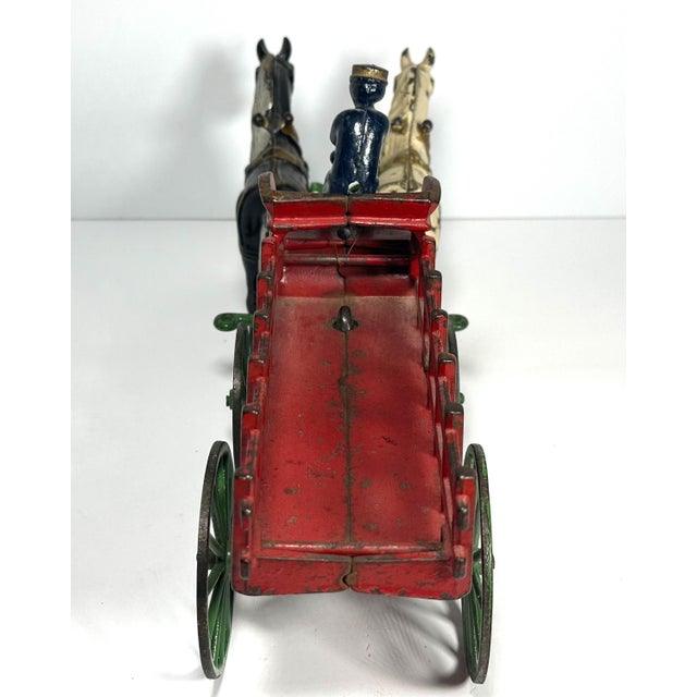 Rare & Original Kenton Horse Drawn Stake Wagon Toy for your consideration. The toy measures approx. 15 inches long, 4...