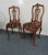A pair of Italian style side chairs , carved walnut frames , burgundy striped floral seats