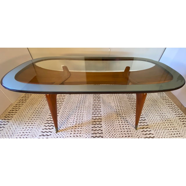 Important Italian Mid-Century Dining Table with 6 Chairs in the style of Paolo Buffa An important and highly refined...