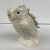A delicate wreath of flowers, one rose and seven daisies surround a velvet pincushion. This sweet owl was made in the last...