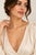 A graceful and contemporary play on classic opera-length pearls, this long station necklace is crafted in solid 14K and...