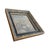An antique floral tapestry panel presented in an exceptional black and gilt frame with remarkable depth and decorative...