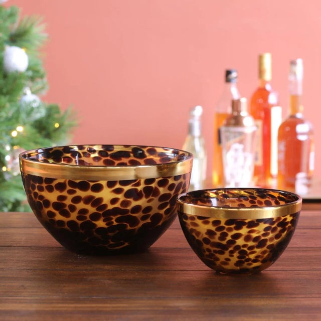The Large Glass Tortoise Bowl The new Tortoise and Gold grouping features pieces of classic and elegant simplicity in...