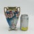 Antique Imperial Nippon vase featuring a hand-painted pink and blue cherry blossom motif with elegant gold highlights and...