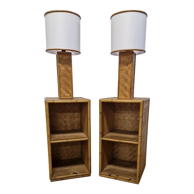 Pair of bedside tables with built-in bamboo and rattan lamps, complete with lampshades. Dimensions (wxdxh) 147 x 40 x 40 cm