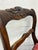 This is an absolutely gorgeous pair of vintage mahogany rose-back Regency (Duncan Phyfe) style ladder-back dining or...