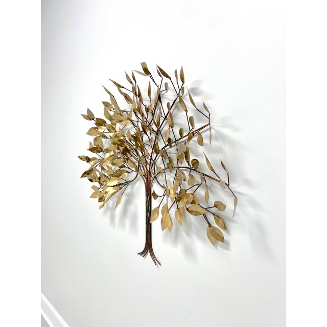 A Brutalist style Tree of Life metal sculpture. Unsigned, in the manner of Curtis Jere. Brass and copper sculpted to form...