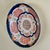 An antique Japanese Imari porcelain bowl in the classic palette of cobalt, iron red, and gilt. Richly hand-decorated and...
