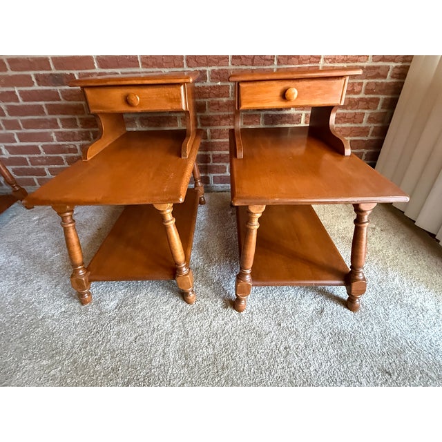 These are rare Heywood-Wakefield step End Tables made from solid maple. Has a single drawer and is stamped with the...