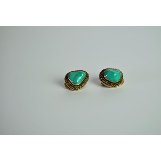 Beautiful vintage ear clips with genuine turquoise and sterling silver. Designed by erik poul fenster, 1960s. Stamped epf...