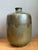 This vintage handcrafted studio pottery vase exemplifies the refined artistry and organic aesthetic that defined mid-...