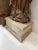 Carved from a single log with lovely details. Sits on a pedestal 21 W X 16 Deep X 11 H