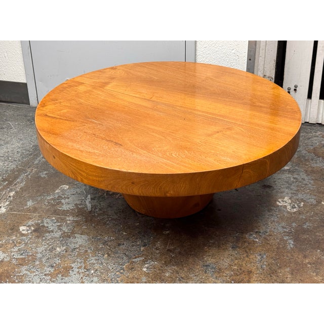 Design Plus Gallery presents the Button Coffee Table by Chista. This sculptural coffee table has a round teak top set over...