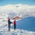 Skiers In The Alps by Toni Frissell Skiers stand and take in a classic alpine scene, Klosters, 1951. (Photo by Toni...
