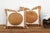 Sold as a matching pair, these pillows feature a large sun-disc medallion hand-embroidered in gold-tan thread, framed by a...