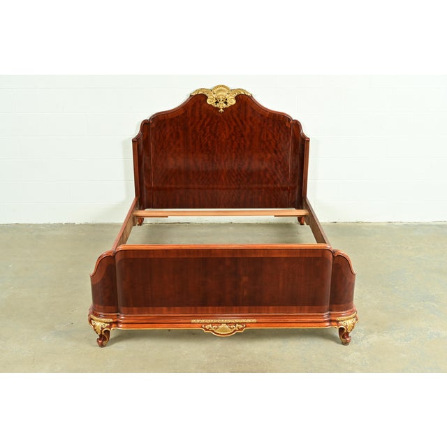 An exceptional French Provincial Louis XV or French Rococo style full or queen size bed In the manner of Paul Sormani...