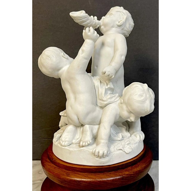 Wood 19th Century Sevres Biscuit Group of Three Frolicking Puttos For Sale - Image 7 of 13