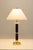 This 1950s table lamp by Frederick Cooper showcases a refined balance of modern materials and timeless design. The piece...