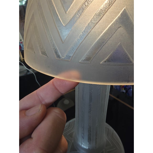 Daum nancy france art deco table lamp, in frosted and partially transparent colorless glass with a reserved geometric...