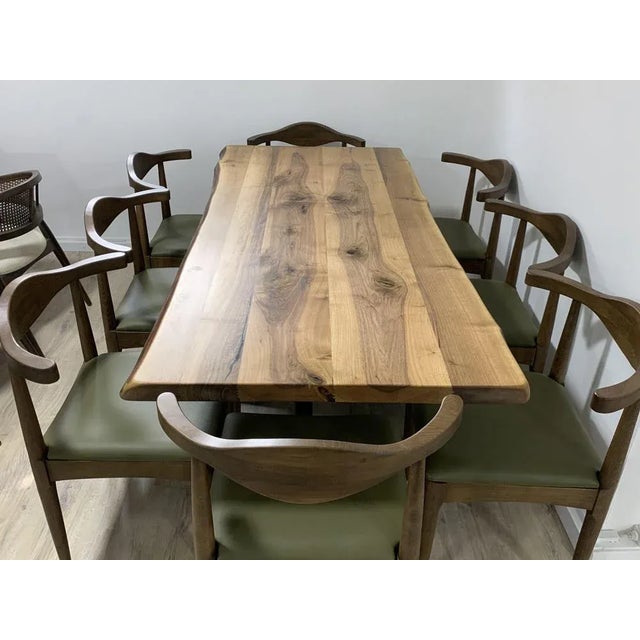 A new massive dining table. Danish style • Condition: New • Tree: Walnut, Massive Dimensions: Height: 78 cm Width: 200 cm...