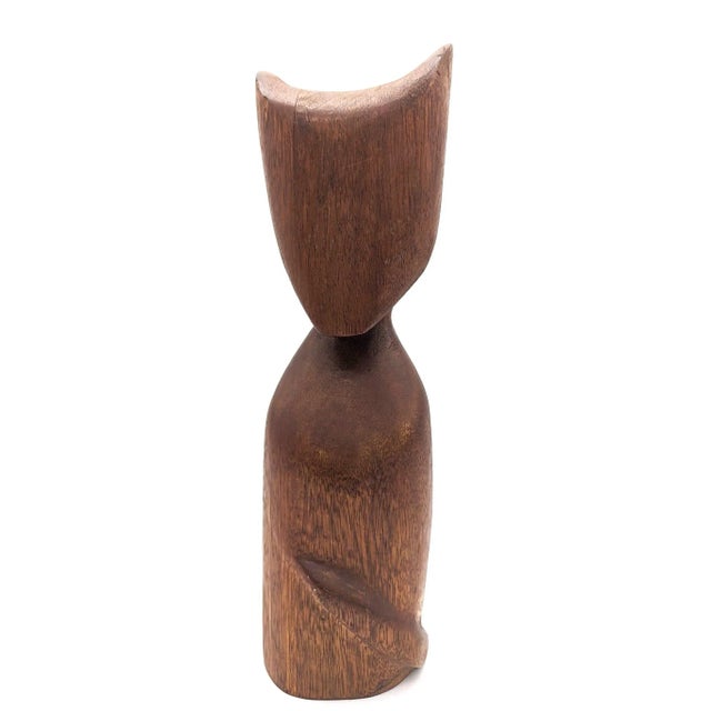 Offered is a turned and lathed Teak wood cat carved from three staved chunks that have been affixed together and smoothed...