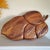 Beautiful hand carved monkey wood serving tray. Much larger than most trays from this era, the tropical leaf-shaped tray...